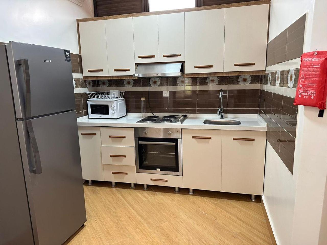 Cascadia Apartments Кигали Экстерьер фото